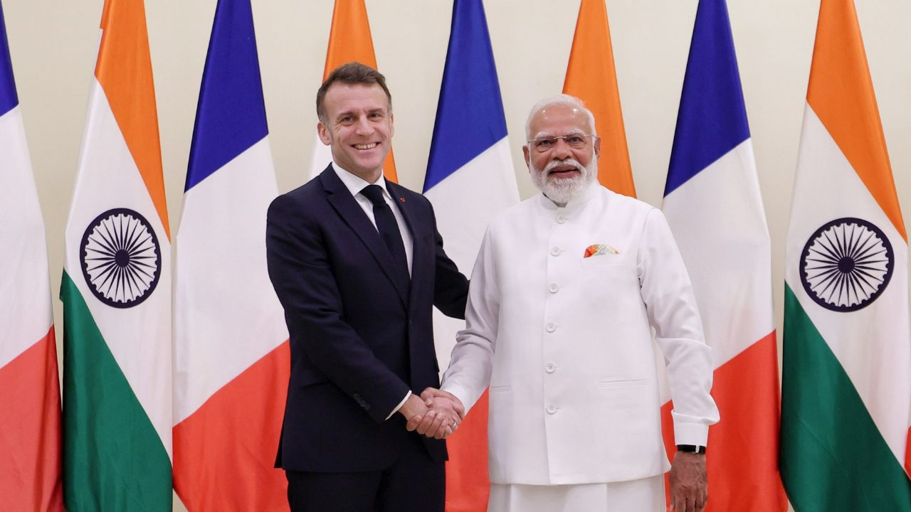 Emmanuel Macron and Narendra Modi PTI