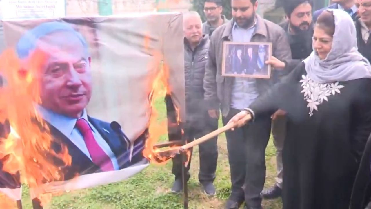 Mehbooba Mufti burn Trump and Benjamin Netanyahu poster
