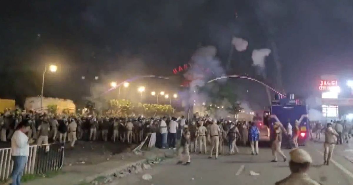 Police deploy force to disperse the members of the Sikh community