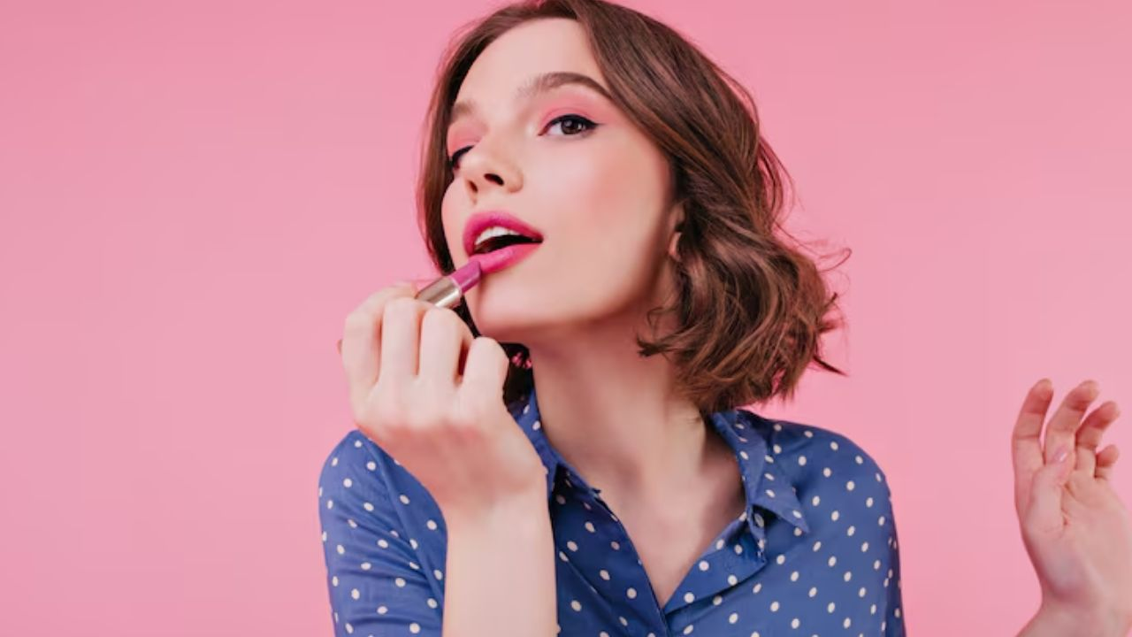 applying lipstick