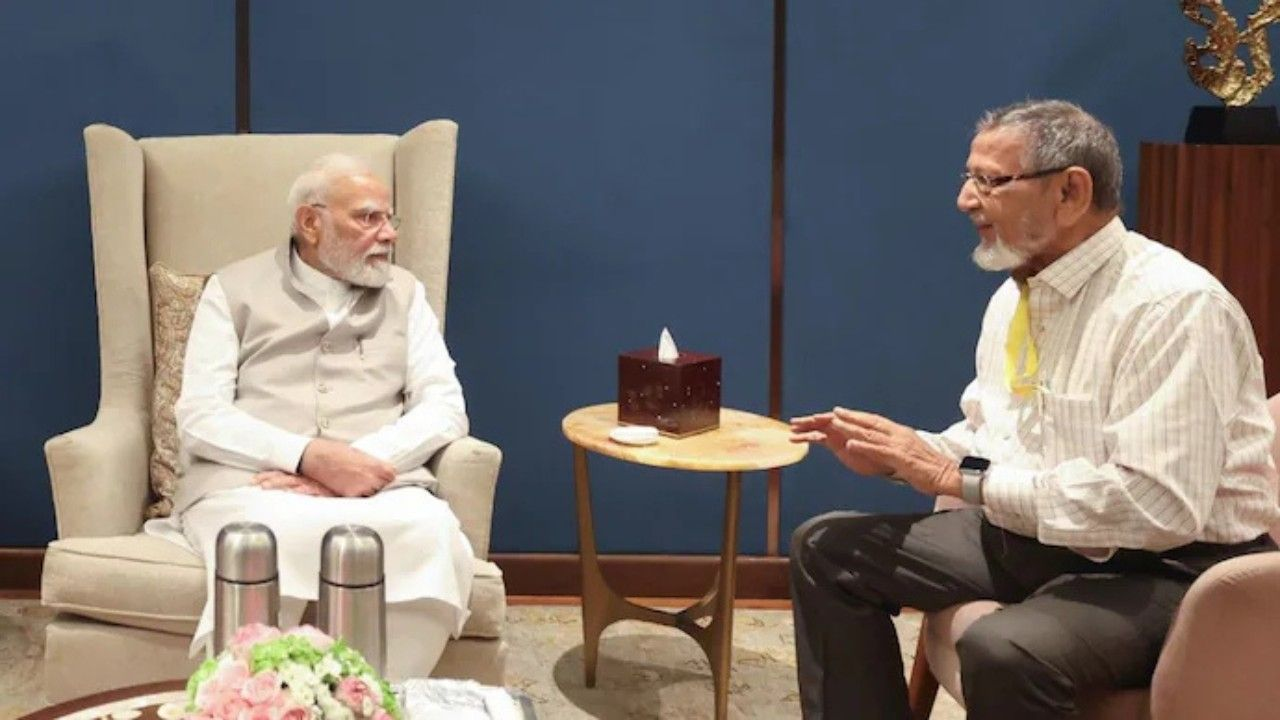 Vohra with PM Modi