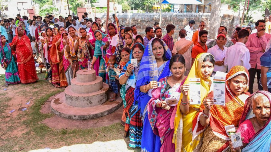 women in voting queue