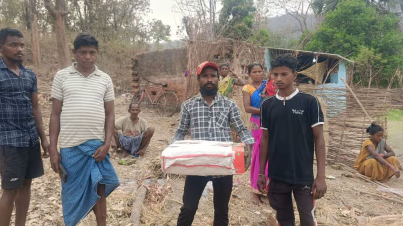 Father Carries Body of New born