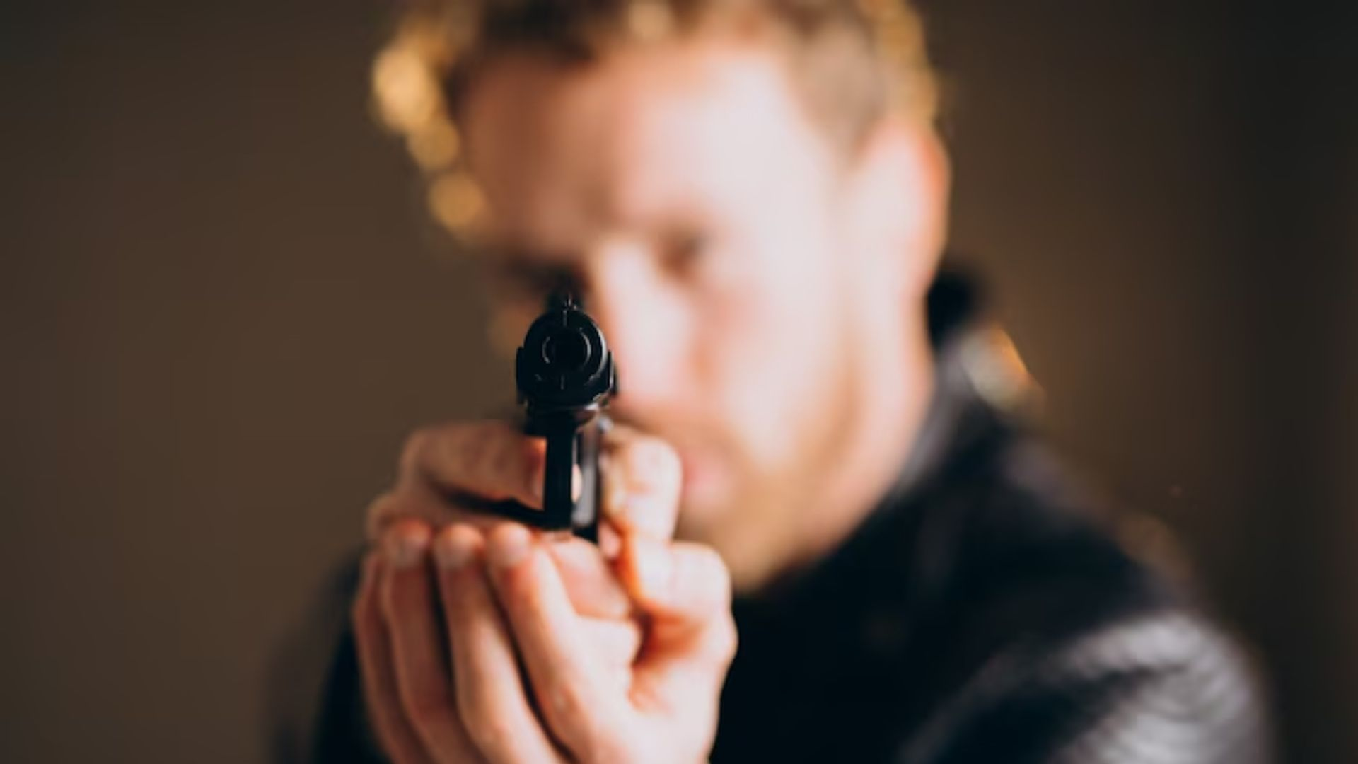 man with gun 