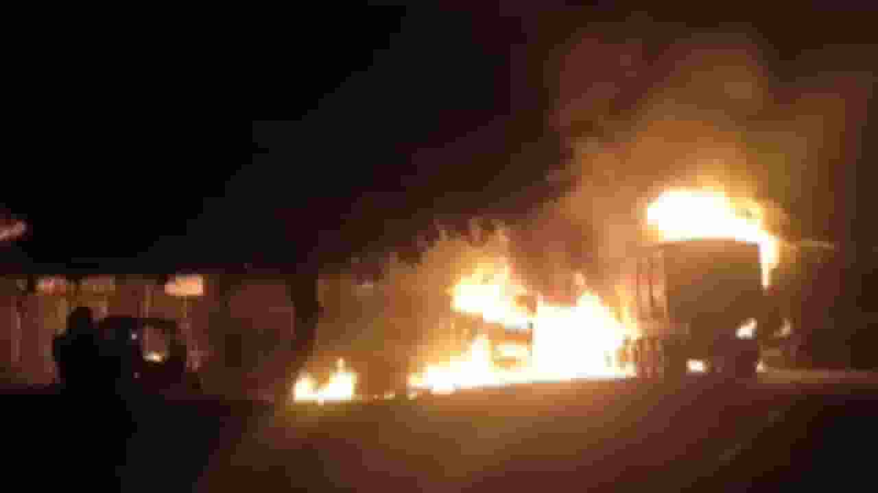 Screen grab of fire in trucks : X