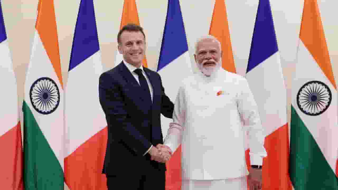 Emmanuel Macron and Narendra Modi PTI
