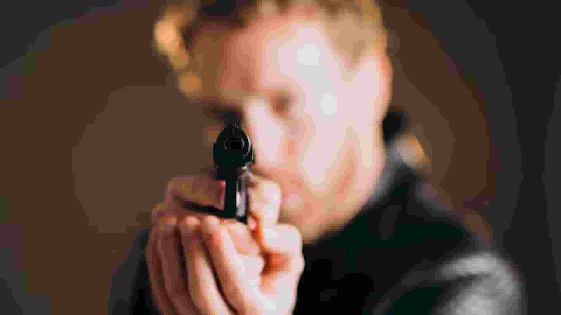 man with gun 