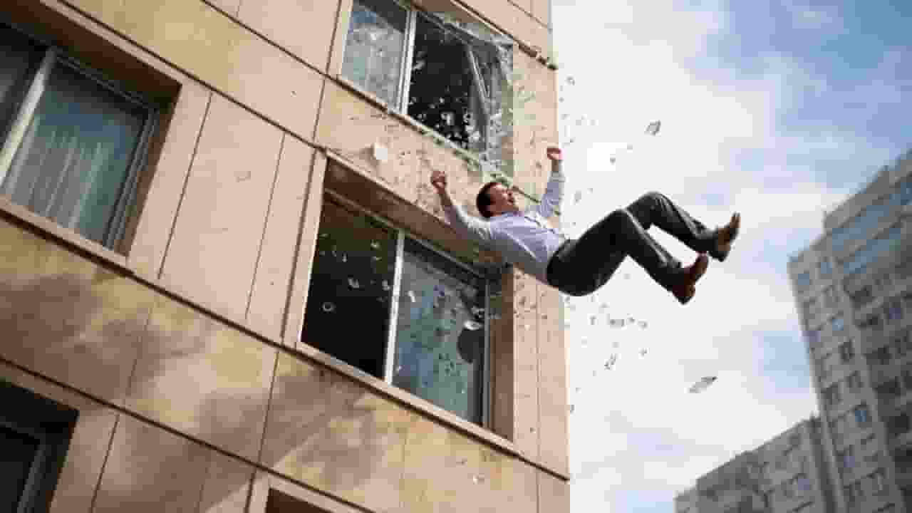 man falling from building