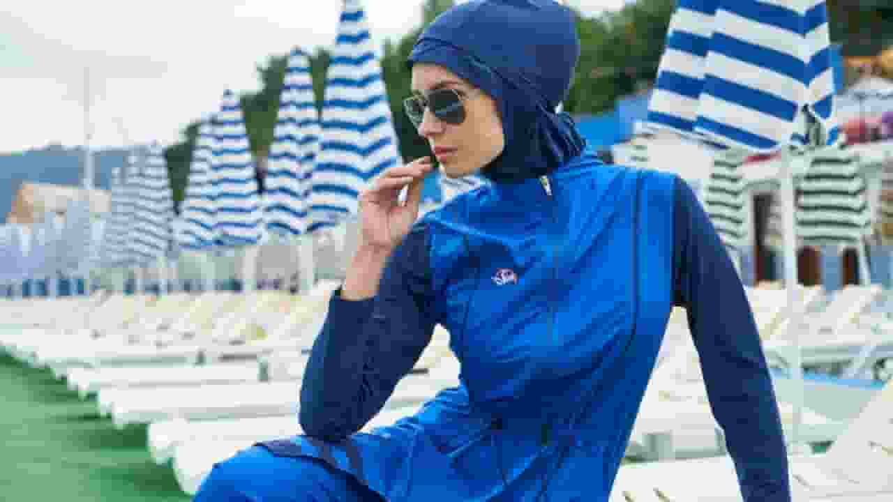 सीरिया के ड्रेस कोड में बुर्किनी, एक साधारण कपड़े को लेकर विवाद क्यों? what is burkini which Syria implanted to their women
