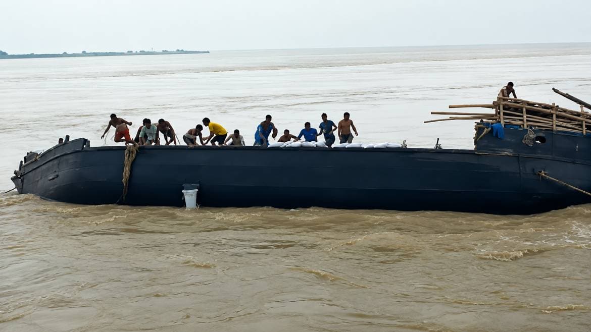 Boat carrying labourers capsizes