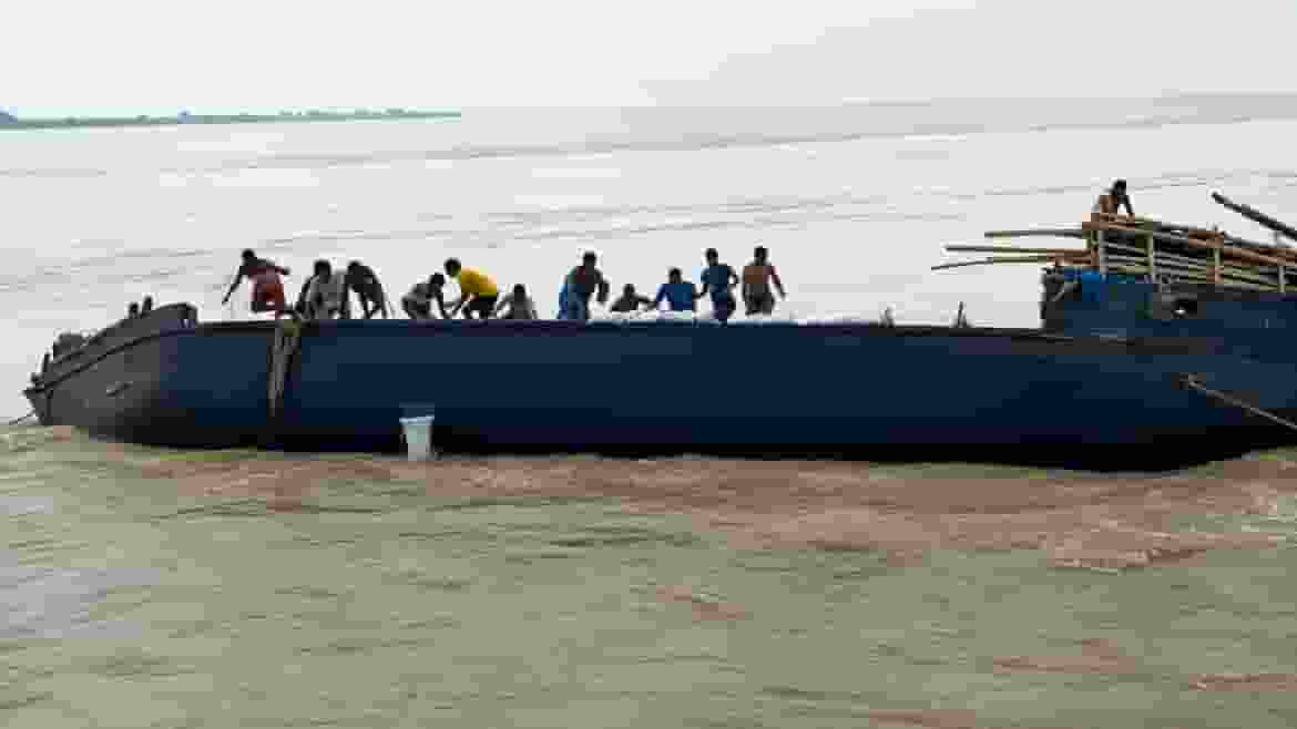Boat carrying labourers capsizes