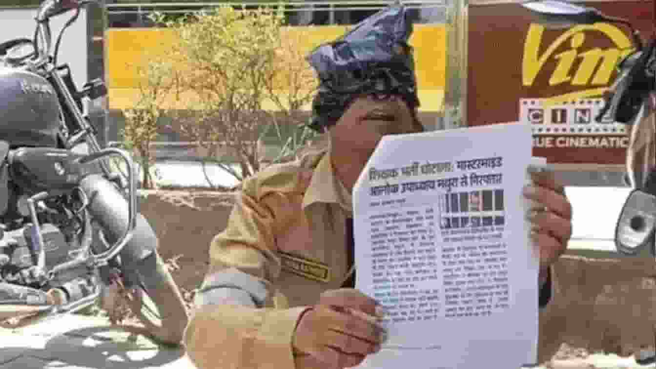 Man protesting as a cockroach