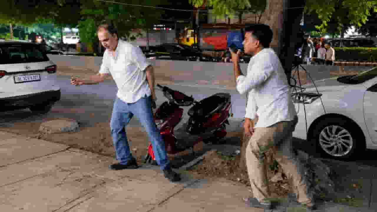 Stopping man from spitting on the road