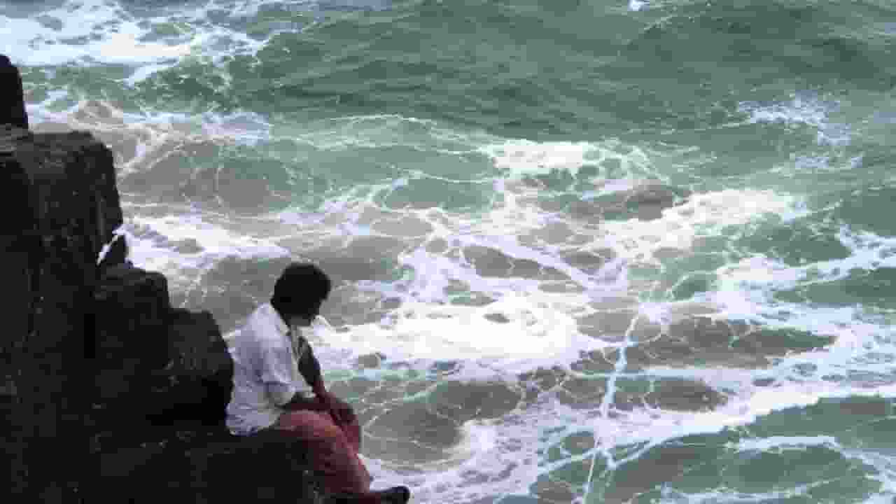 AI Generated Image of a Man Sitting on the Rock