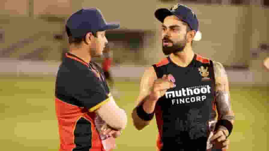 Sushant Mishra with Virat Kohli IPL